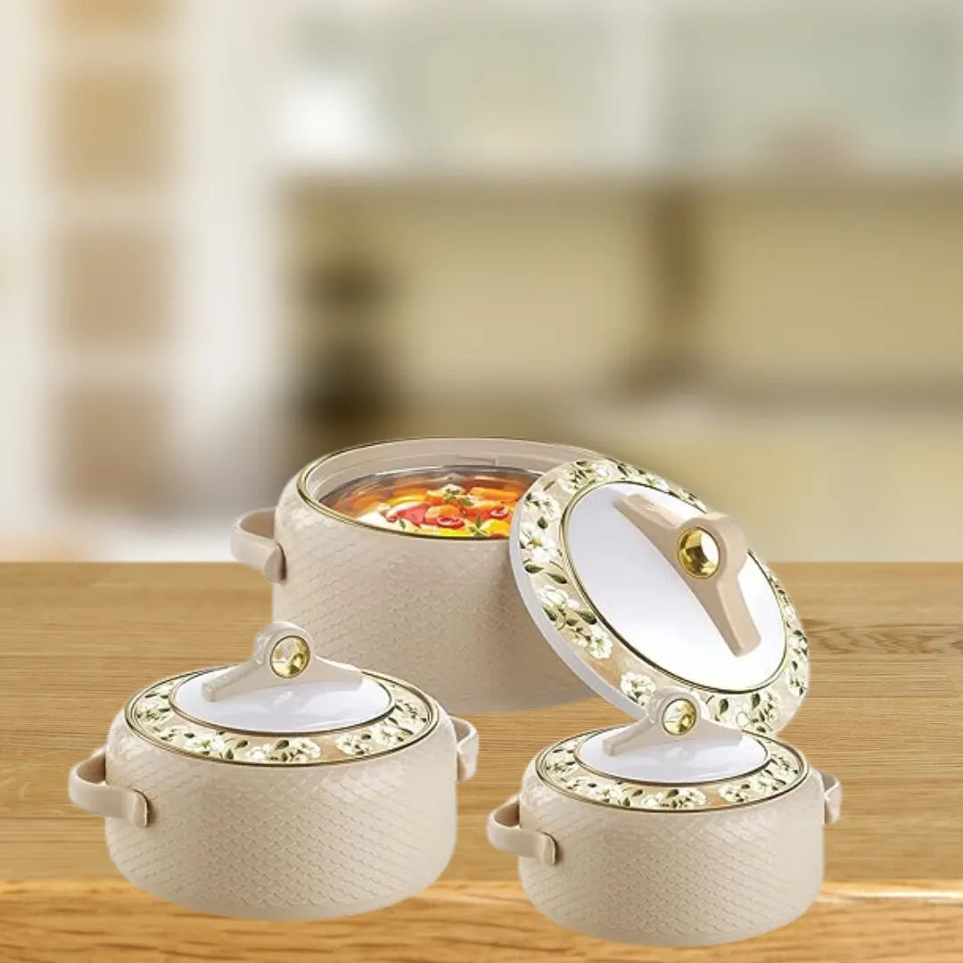 A table showcasing three white ceramic pots with lids, including the NAYASA Coral Casserole collection.