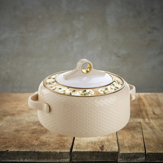 AYASA Coral Casserole Light Brown - a white pot with a lid resting on a wooden table.